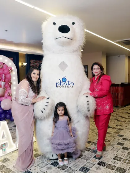 A fun photo opportunity with a polar bear mascot at a birthday party. I capture all the fun details and entertainment that make your child's party special.