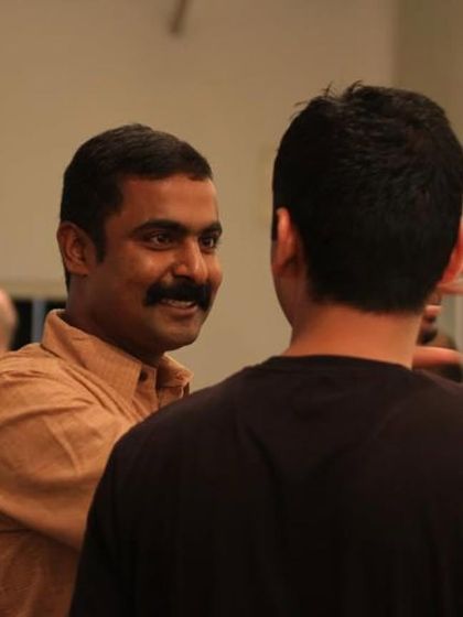 A candid shot of artist Cop Shiva at his debut solo show in 2012.