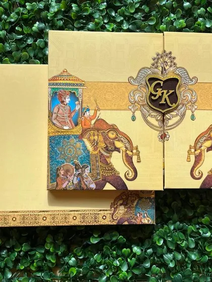 Celebrate your heritage with a vibrant, traditional design. This card features beautifully illustrated royal elephants and a custom monogram, all brought together in a rich color palette that feels both classic and festive.