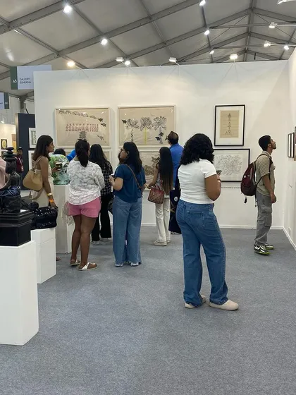 A wide shot of the bustling atmosphere at our Art Mumbai booth.