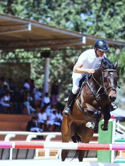 The thrill of victory begins here. Our arena is built to host prestigious equestrian events like the Karnataka State Equestrian Competition, providing a professional backdrop for moments of peak performance and skill.