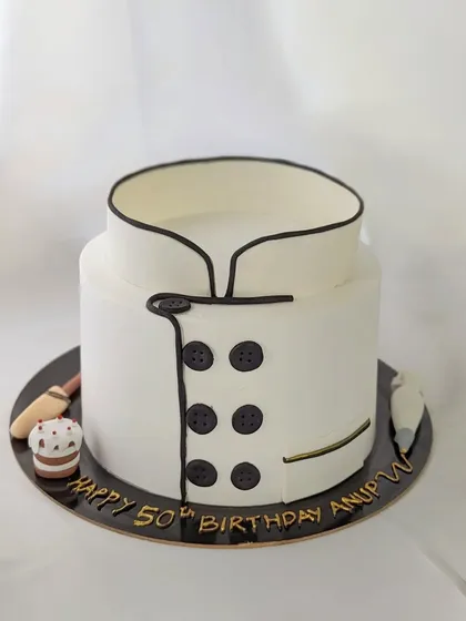 Made for a pastry chef's 50th birthday. It was an honor to create this chef's coat cake for a fellow professional in the industry.