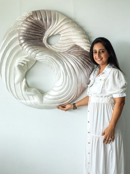 Standing with "The Awakening Cycle" (Series 3), a piece that embodies the threshold where vulnerability becomes strength. The shift in color from dark to light represents a powerful turning point in one's journey.