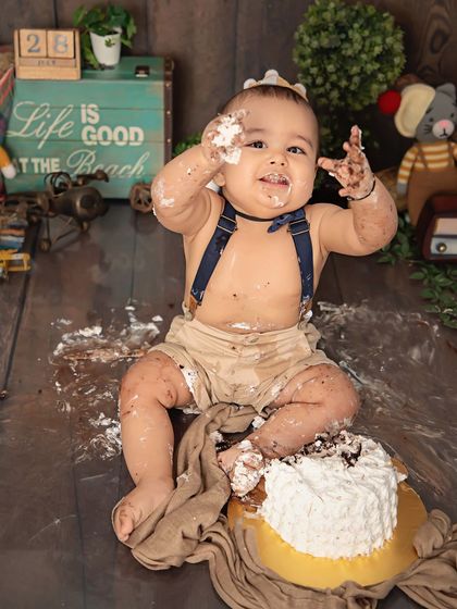 When the cake is just too good. We love capturing these hilarious and messy moments during our cake smash sessions. It's all about having fun.