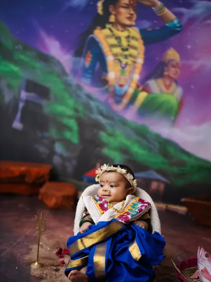 A close-up of the little Nakhwin, her expression full of wonder. These sessions are a beautiful tribute to local culture and traditions.