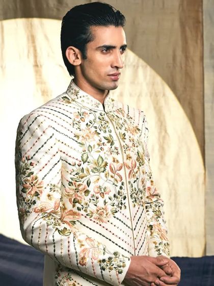 The fine details of our Resham and Zari embroidery, combined with subtle sequin work, create a texture that is both visually stunning and luxurious to the touch.