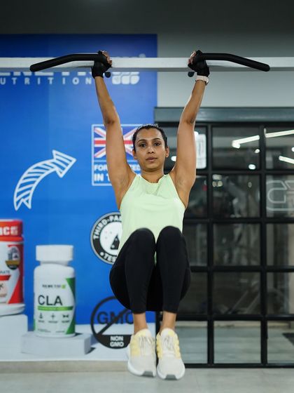 Building a strong core and upper body with hanging leg raises. This is a testament to dedication and functional strength.