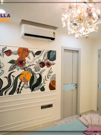 The opposite wall features a beautiful, custom-painted floral mural, adding a touch of artistic flair and personality to the room.