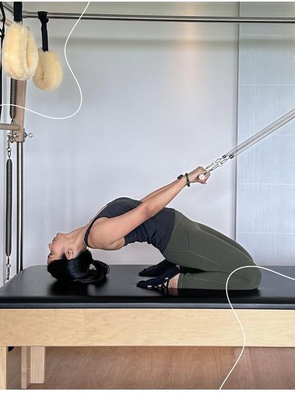 The 'swan' on the Cadillac is a beautiful back extension exercise. It requires both strength to lift and control to move gracefully, all guided by the breath.