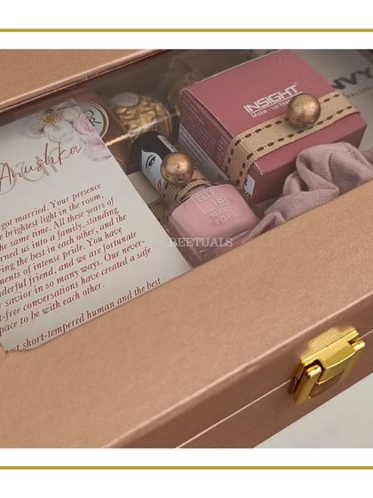 A personalized letter for the bride, 'Anushka', is revealed inside the wedding gift box, adding a deeply personal touch.
