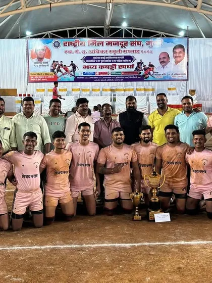 The team posing with the championship trophy and banner after the prize distribution ceremony.