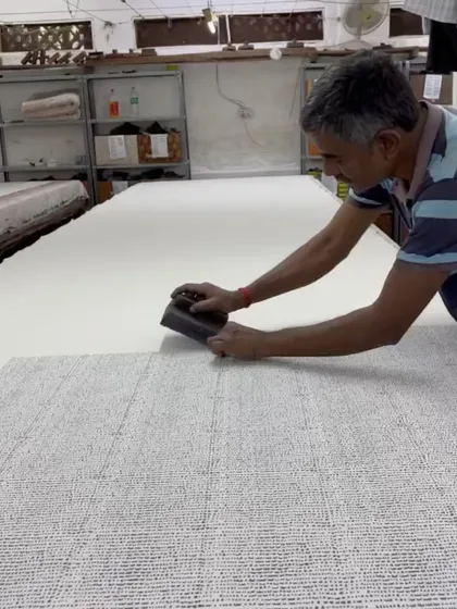 We open our doors to share the magic of block printing. This image from one of our workshops shows a participant learning the hands-on process, connecting directly with the craft and the artisans who sustain it.