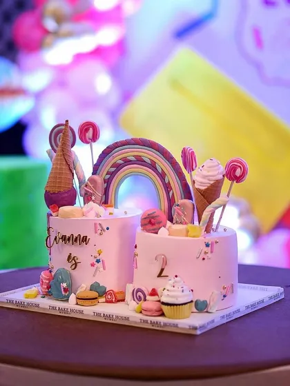 The full view of the 6kg double birthday cake on its custom board. Creating large, ambitious cakes like this for your special events is a challenge I absolutely love.