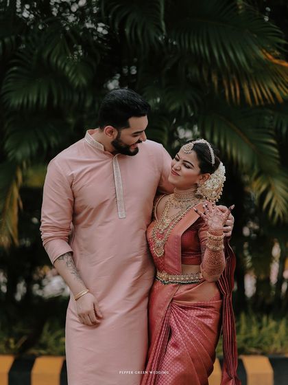 A sweet and classic portrait of the bride and groom, their smiles radiating happiness.