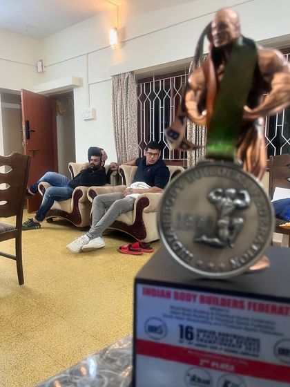 The trophy in focus, with my team resting in the background. After the battle, rest is essential.