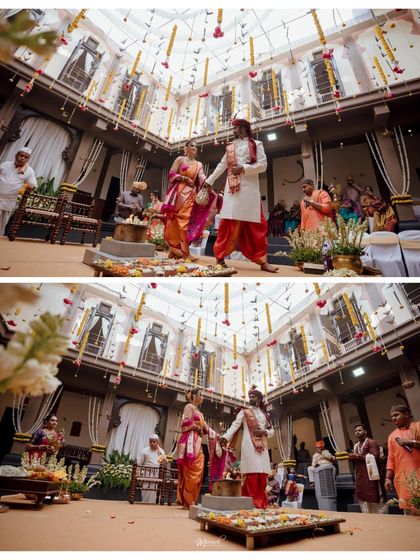The Saptapadi, or seven steps, around the sacred fire in a traditional Marathi wedding, captured from a wide angle to show the grandeur of the venue.