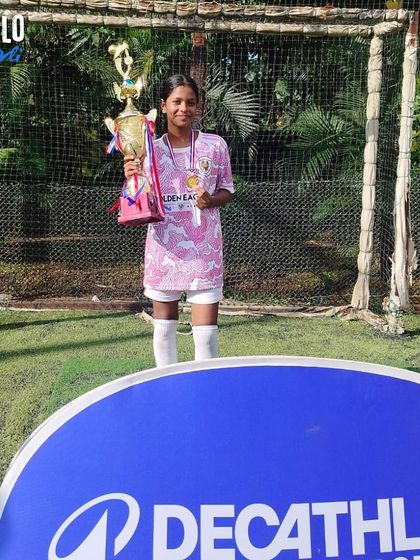 Celebrating individual success within the team. This player proudly shows off her trophy after the Sparta X Decathlon League win.