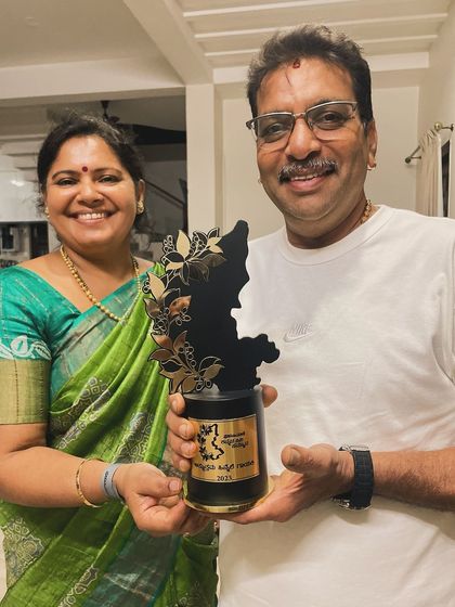 My parents holding my Prajavani Cine Samman award. Their support is my biggest strength. Thank you all for your love.