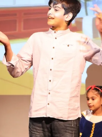 An actor using grand gestures to express his character's feelings. We teach children to use their entire body to communicate and tell a story.