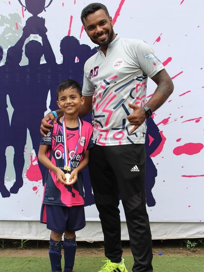 Coach Anil with one of our standout players from the tournament.