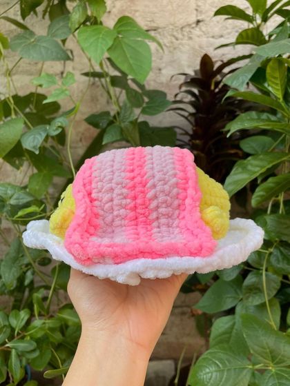 Here is Gudetama tucked under his little bacon blanket. I used different shades of pink to create the striped look on the blanket.