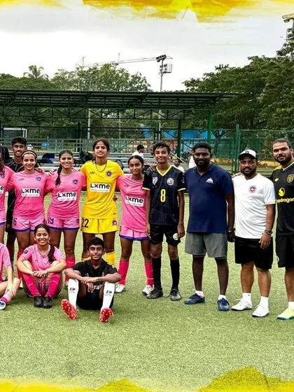 Our Under-15 boys with the Warriorz FC women's team after a fantastic practice session.