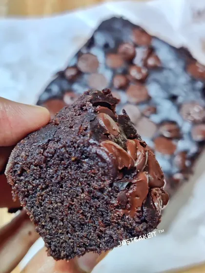 I believe everyone deserves a delicious treat, which is why I offer healthy options. This close-up shows my guilt-free Mixed Millet Brownie, which is vegan, gluten-free, and contains no refined sugar or dairy.