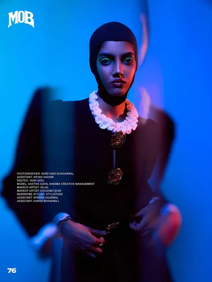 A 'Neo-Baroque Noir' editorial published in MOB Journal. This image plays with colored gels and a slow shutter drag to create a modern, edgy portrait with a classic feel.