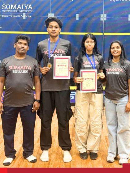 Our squash players Raadha Gurjar and Muhammed Asad Pasha with their coaches after winning silver at the DSO State Squash Championship Team Event.