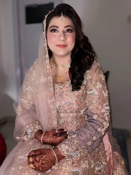 A happy and confident Walima bride. The makeup is designed to last through the night while feeling lightweight and comfortable.