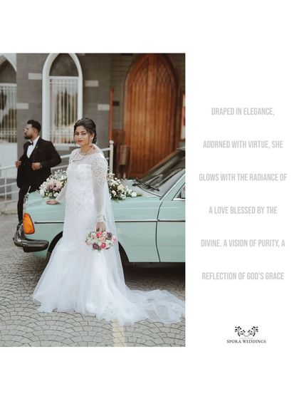 A beautifully composed shot of the bride and groom with their vintage car, a perfect blend of elegance and style.