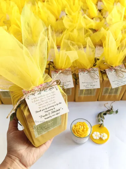 This is what a complete, heartfelt gift looks like. For this Haldi ceremony, we created a custom gift box with a vibrant yellow peony candle and a matching wax sachet, all tied together with a personalized thank you note. It’s the little details that make a big difference.