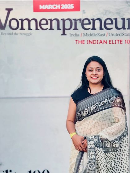 Standing next to the cover of Womenpreneur magazine, which featured me as part of 'The Indian Elite 100'. This was a truly special way to celebrate International Women's Day.