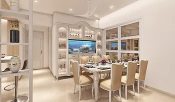 I love bringing a touch of timeless elegance to modern homes. This dining area features a vintage-style display and dining set, complete with a stunning built-in aquarium that becomes a living piece of art.