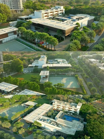 An aerial perspective of the lush and modern BLVD CLUB in Bengaluru. Our drone photography effectively captures the layout, amenities, and exclusive atmosphere of resorts and clubs.