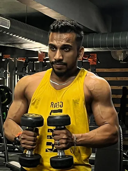 Holding these dumbbells represents the weight of my commitment. Every workout is a step towards becoming a stronger version of myself.