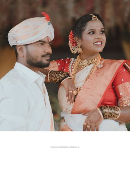 A stylish portrait of the couple, the bride resting her arm on the groom's shoulder, both looking confidently forward.