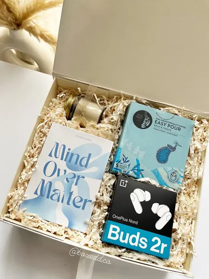 A wellness-focused birthday hamper featuring a journal, premium coffee, and OnePlus earbuds. It’s the perfect gift to encourage relaxation and self-care.