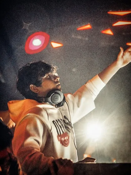 A photo that perfectly captures the feeling of an epic night with epic beats. The lights, the music, and the crowd all coming together.