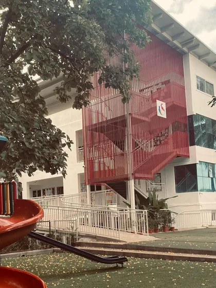 A quick-fix project involving the design of an external steel frame staircase for a school building, adding a functional and visually striking architectural element.