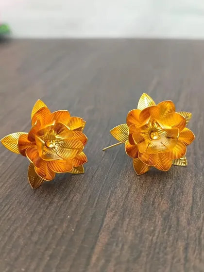 A pair of German silver flowers with a golden polish, an affordable and beautiful offering for your home temple.