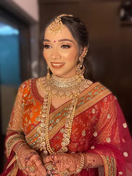 Purva's radiant smile completes her perfect bridal look. The makeup was designed to last through the entire ceremony while feeling light and comfortable.