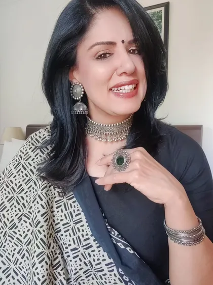 When you want your jewelry to be the star, go for a statement piece like this 925 silver choker. I paired it with a simple black kurta to let the necklace truly shine.