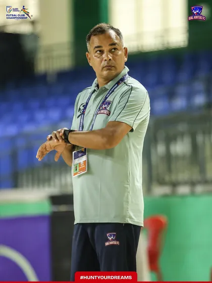 Our head coach watching over the warm-up session.