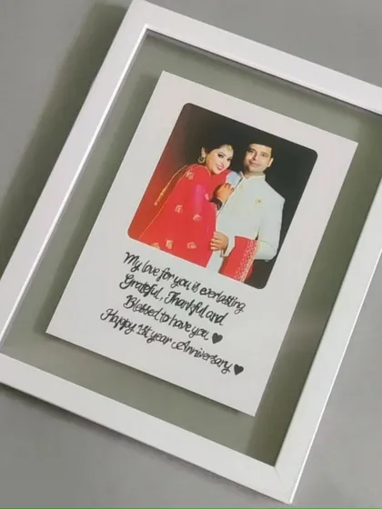 My bestseller, the floating acrylic frame. I take your favorite photo and pair it with a handwritten message, creating a beautiful illusion that your memory is suspended in air. It's a modern and meaningful way to celebrate an anniversary or any special moment.