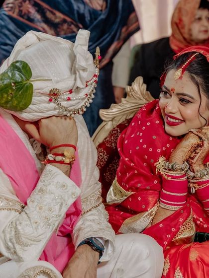 A playful, candid shot from our wedding day. The joy in this photo is a testament to the friendship that is the foundation of our marriage.