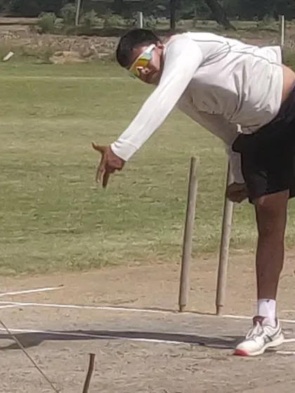 A side-on view of a bowler's follow-through. Proper completion of the action is important for both speed and injury prevention.