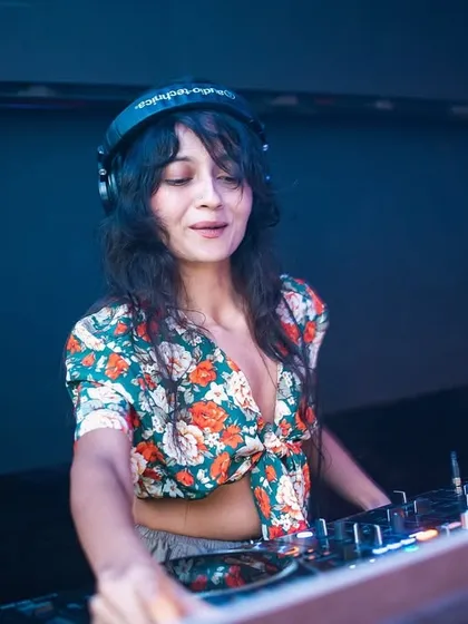 A moment of calm behind the decks. Even in the middle of a wild party, there are these quiet moments of focus and connection with the music.