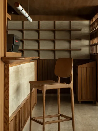 A close-up of the bar stool and counter.