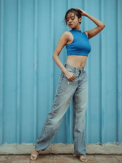 A clean, modern fashion portrait that plays with color and texture. This style is perfect for e-commerce and catalogue photography, where the focus is on the apparel in a crisp, contemporary setting.
